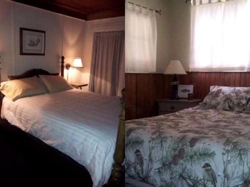 ein Schlafzimmer mit großem Bett und Fenster in der Unterkunft Spectacular Riverside Getaway Cabin with Claw Foot Bathtub in Castella, California in Dunsmuir