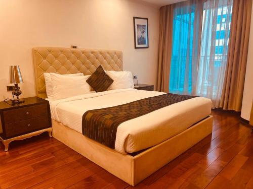 Ein Bett oder Betten in einem Zimmer der Unterkunft Inter Luxury Hotel