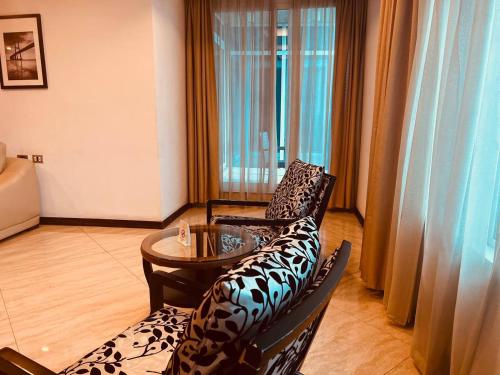 Ein Sitzbereich in der Unterkunft Inter Luxury Hotel