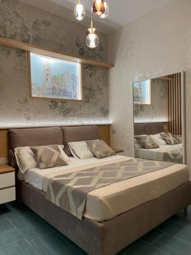 Postel nebo postele na pokoji v ubytování Orchidea Holiday