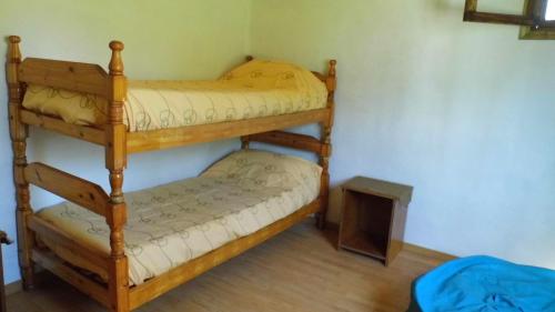 Ένα ή περισσότερα κρεβάτια σε δωμάτιο στο Cabañas Aike