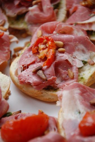 a close up of a sandwich with meat and tomatoes at Weena House in Rotterdam