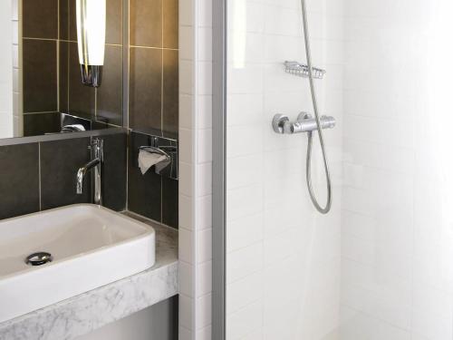 Ванная комната в Mercure Bordeaux Centre Ville
