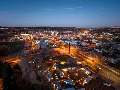 a city lit up at night with street lights at Airstream Stay Near Whiskey Row and Granite Creek in Prescott, AZ in Prescott
