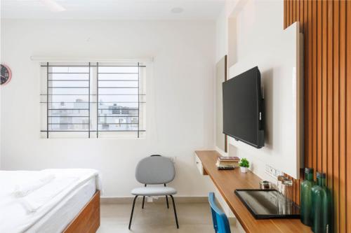 Televisyen dan/atau pusat hiburan di OBS Luxury Suites - JP Nagar