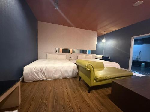 Un ou plusieurs lits dans un hébergement de l'établissement Lisa Motel