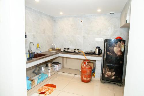 Η κουζίνα ή μικρή κουζίνα στο Thugi's homestay