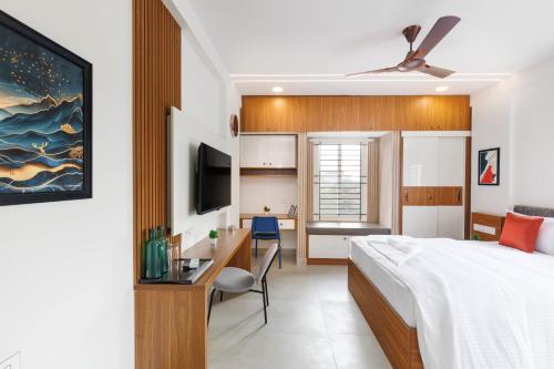 Katil atau katil-katil dalam bilik di OBS Luxury Suites - JP Nagar
