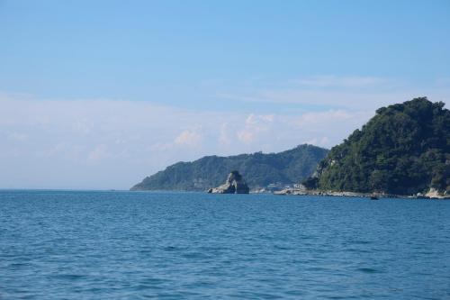 an island in the middle of a large body of water at DokiDoggie館山DIANA in Tateyama