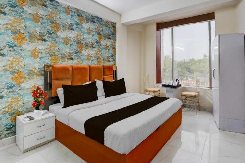 Super Hotel O Sector 51 Metro Station Formerly Shubham Residencyにあるベッド