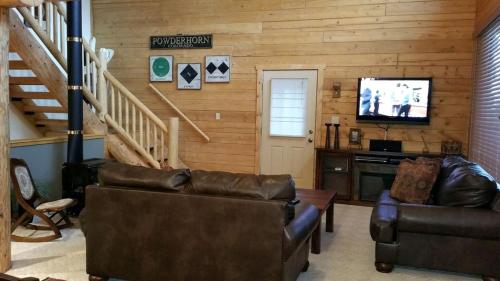 A television and/or entertainment centre at Spacious Mountain Ski Cabin situated on the Grand Mesa, Colorado