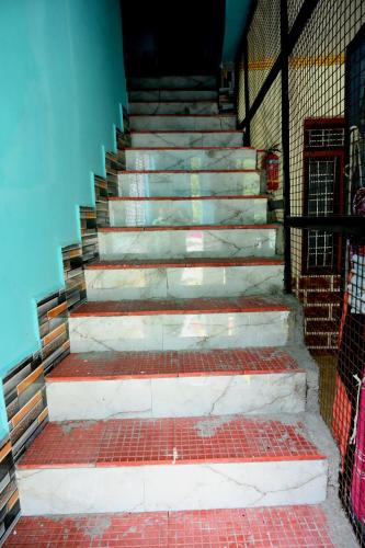 a set of stairs in a building at maa kalishila home stay in Ukhimath