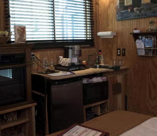 a kitchen with a sink and a counter top at Romantic Glamping Getaway with a Shared Hot Tub and Hiking Trails near Nashville, Tennessee in Gordonsville