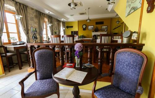 a living room filled with chairs and a table at Heritage Boutique Hotel Adriatic-Adults only in Orebić