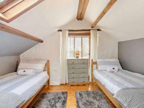 Ένα ή περισσότερα κρεβάτια σε δωμάτιο στο 3 Bed in Bude WVSTC