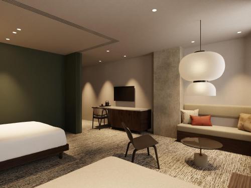 Ένα ή περισσότερα κρεβάτια σε δωμάτιο στο TRANSCENDER HOTEL Yokohama