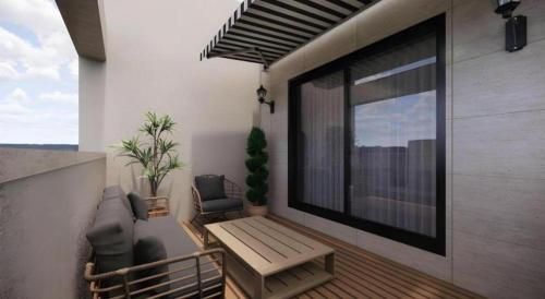 a balcony with a table and chairs on a building at HOTEL D EDITION in Daejeon