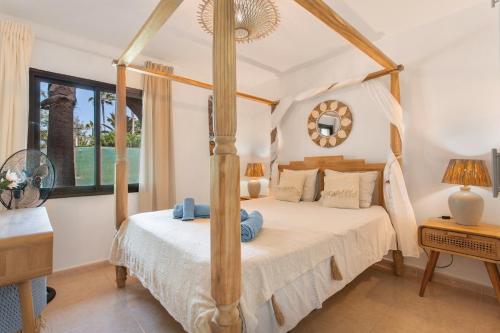 Postel nebo postele na pokoji v ubytování Blanca del Sol Oasis Duna