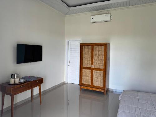 TV a/nebo společenská místnost v ubytování Octa House Pandawa Beach