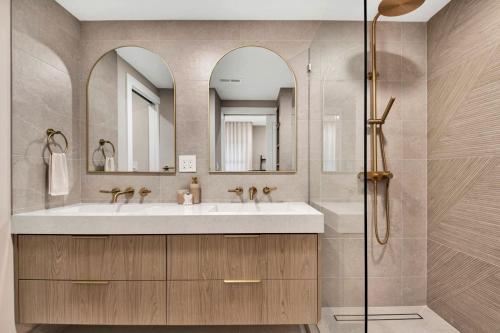 a bathroom with a sink and two mirrors at Luxury Mountain Retreat with Hot Tub Near Lake Hartwell & Clemson, SC in South Union
