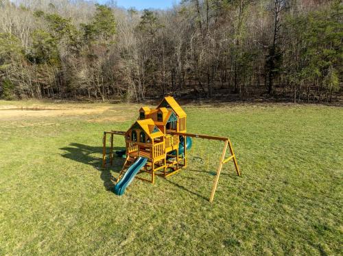 an aerial view of a playground in a field at Splendid Safari Tent Sanctuary near Smoky Mountains in Tennessee in Parrottsville