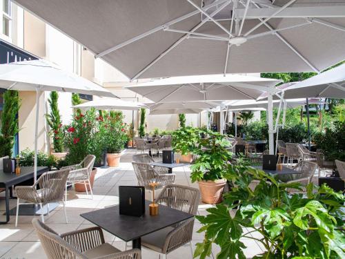 Ресторан / где поесть в Le Louis Hotel Versailles Château - MGallery Collection