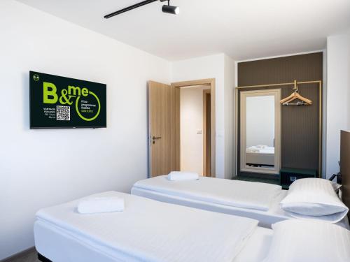 B&B HOTEL Maribor Orelにあるベッド