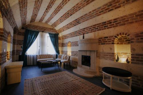 Χώρος καθιστικού στο Yılkı Cave Suites