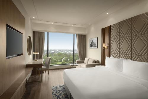 Cama o camas de una habitación en Radisson Hotel Delhi MG Road