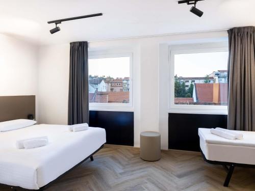 B&B HOTEL Maribor Orelにあるベッド