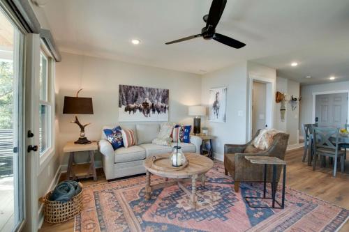 a living room with a couch and a table at Gorgeous Cabin Great for Groups or Families with Jacuzzi, Fire Pit and Views in Alabama in Grant
