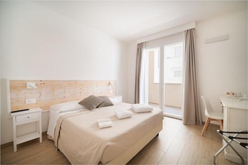 Ένα ή περισσότερα κρεβάτια σε δωμάτιο στο Ardenne Guest House