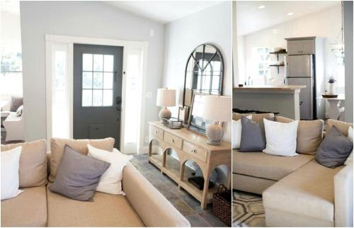 a living room with a couch and a mirror at Idyllic Waterfront Rental with Shared Pool Access in Jupiter, Florida in Delta