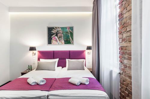 Katil atau katil-katil dalam bilik di Liberum Residence Old Town