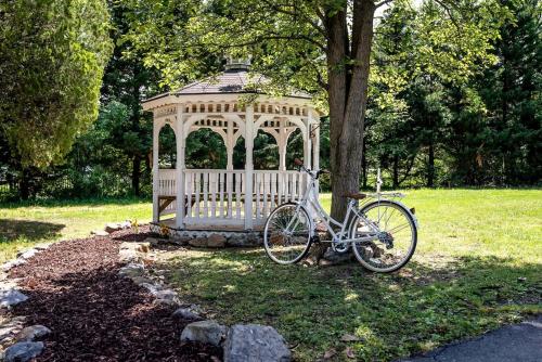 a bike parked in front of a gazebo at Elegant Historic Suite with Mountain Views in Luray, Virginia in Luray