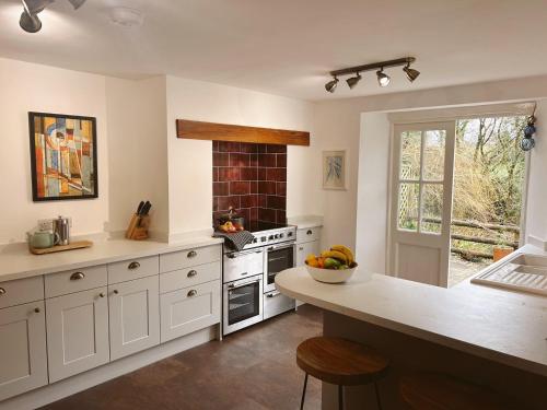 Η κουζίνα ή μικρή κουζίνα στο 3 Bed in Bucks Mills OLDSB