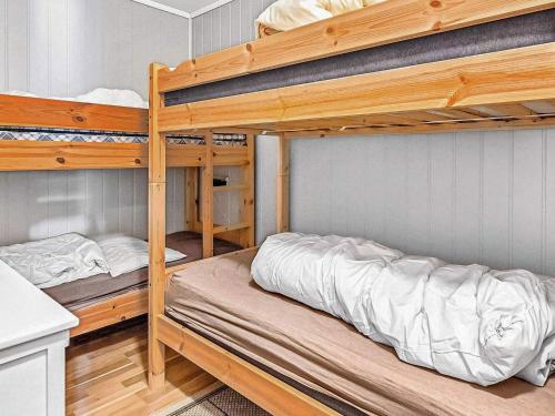 a bedroom with two bunk beds in a room at 6 person holiday home in Ånneland in Ånneland