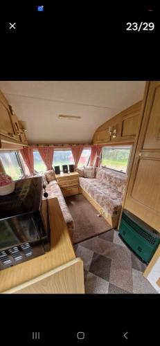 an image of a small room in an rv at Parkhouse farm caravan in Easby