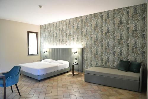 Postel nebo postele na pokoji v ubytování Agriturismo La Camilla