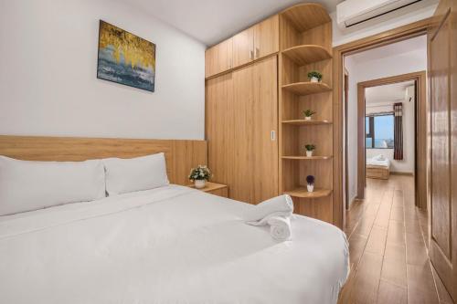 Postel nebo postele na pokoji v ubytování Seaview apt Da Nang