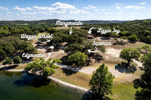 an aerial view of an island in the water at Beautiful Tented Cabin in Texas for Glamping by Guadalupe River in Hunt