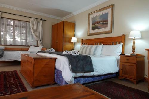 Letto o letti in una camera di Brooklyn Guesthouses