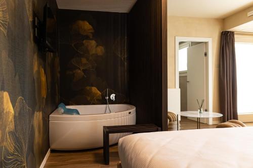 Postel nebo postele na pokoji v ubytování Agriturismo Il Ceraseto da Tomasi