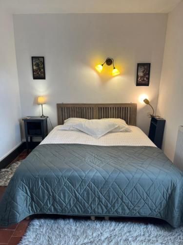 Postel nebo postele na pokoji v ubytování Gîte de la Kélidoine
