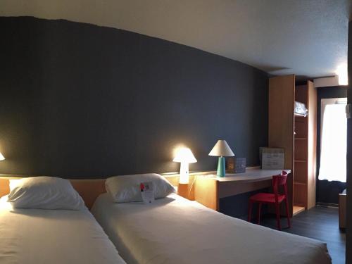 ibis Rochefortにあるベッド