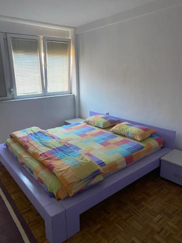 Llit o llits en una habitació de Apartment SKY