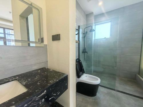 Koupelna v ubytování Shanju Bieyuan Homestay (Yangshuo Yulonghe Branch)