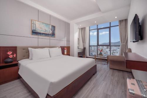 Star Hotel and Spa Danangにあるテレビまたはエンターテインメントセンター