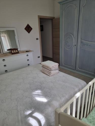 Ένα ή περισσότερα κρεβάτια σε δωμάτιο στο Rosy Vacation Home