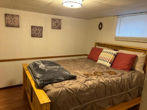 a bedroom with a large bed in a room at Slightwork in Gillette